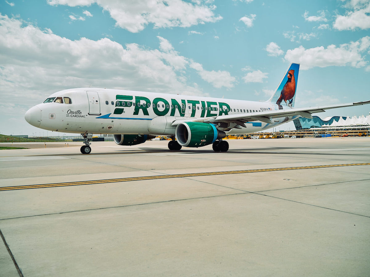 An image of a Frontier Airlines aircraft on the tarmac.