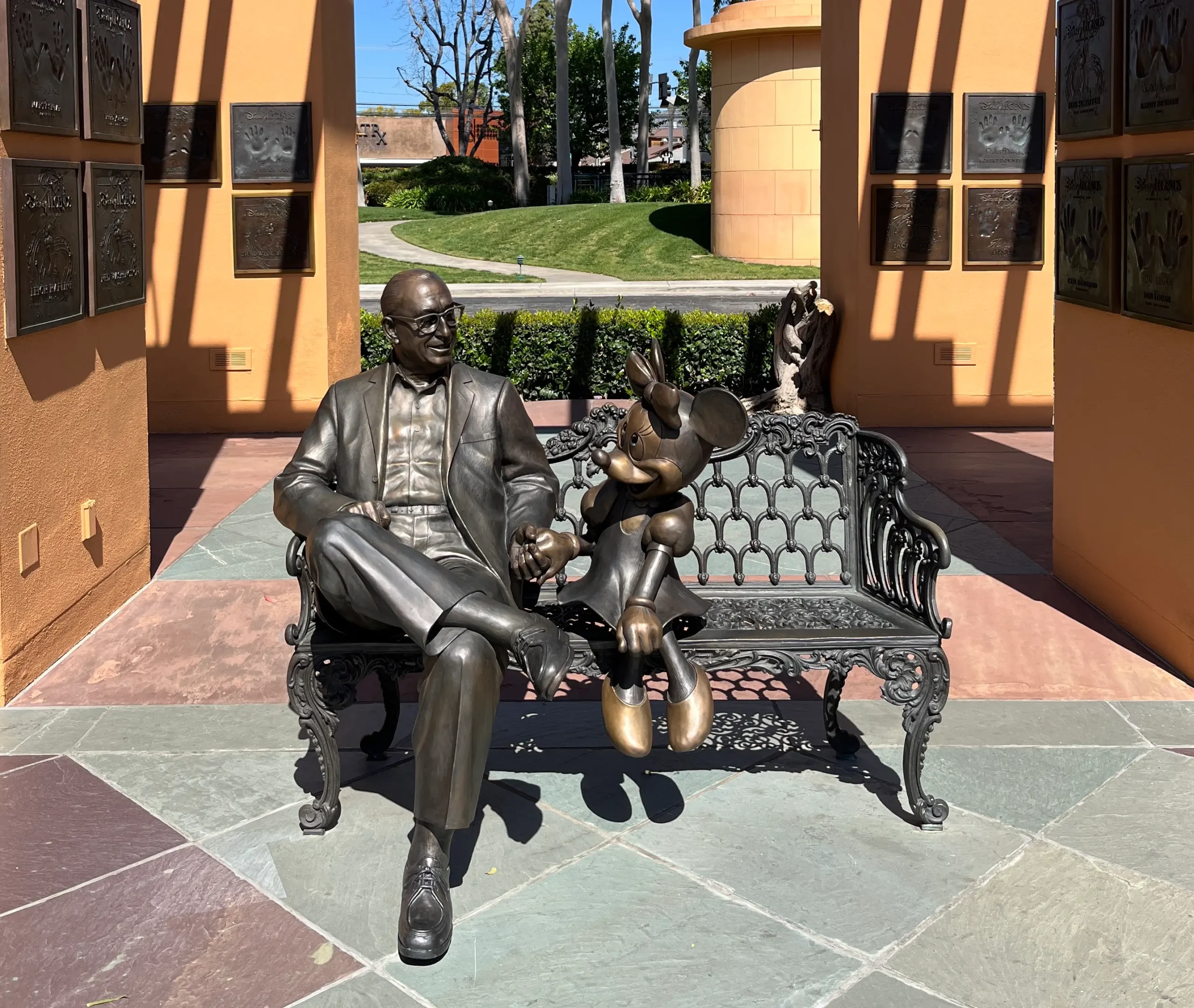 An image of Walt Disney and Minnie Mouse in Disney Legends Plaza