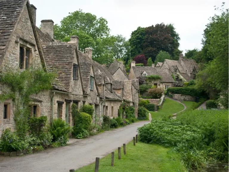 Traditional stone cottages in a Cotswolds village in the English countryside