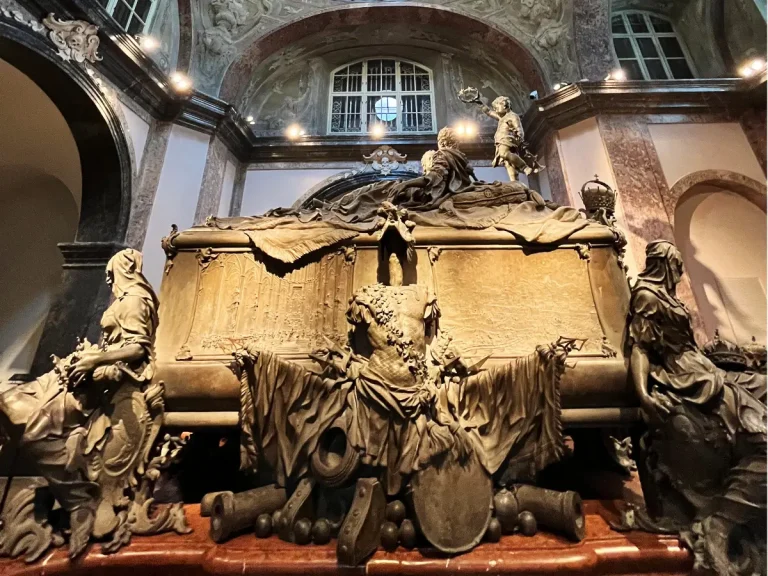 Maria Theresa's elaborate double sarcophagus inside the Imperial Crypt Vienna, the underground burial site of the Habsburg dynasty.