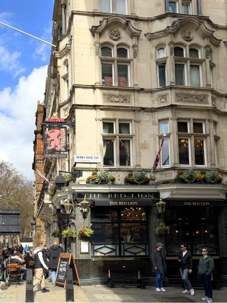 The Red Lion pub in Westminster London near Parliament with people outside