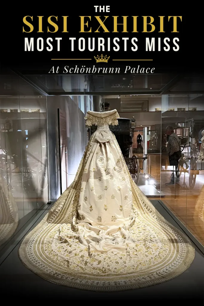 Pinterest pin featuring the replica of Empress Elisabeth’s wedding dress at the Imperial Carriage Museum in Vienna.