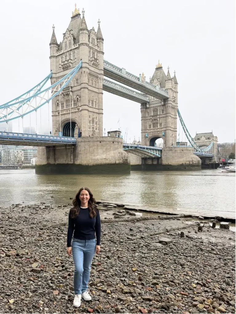 Tower Bridge in London viewed from Horsley Downs with a person standing in the foreground