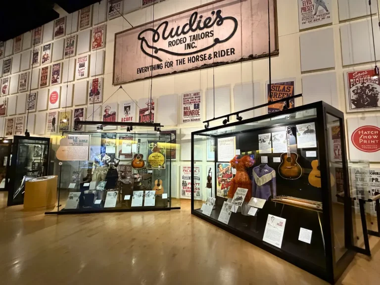 Nudie Cohn exhibit featuring western clothing, guitars and memorabilia at the Country Music Hall of Fame in Nashville.