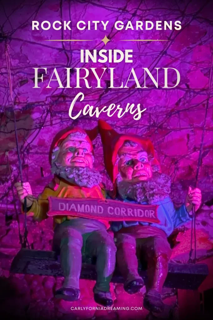Two glowing gnome figures inside Fairyland Caverns at Rock City Gardens on Lookout Mountain, surrounded by colorful black-light displays and nursery rhyme scenes.