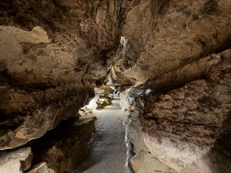 Paved walking path and rock walls on the Ruby Falls cave walk in Chattanooga, Tennessee.