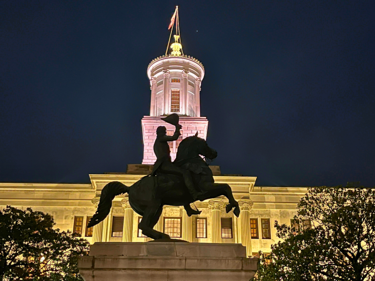 Tennessee State Capitol illuminated at night during a walking ghost tour in downtown Nashville.