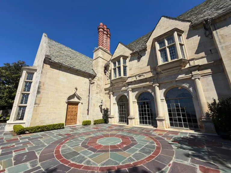 Tudor-style exterior and stone terrace at Greystone Mansion in Beverly Hills