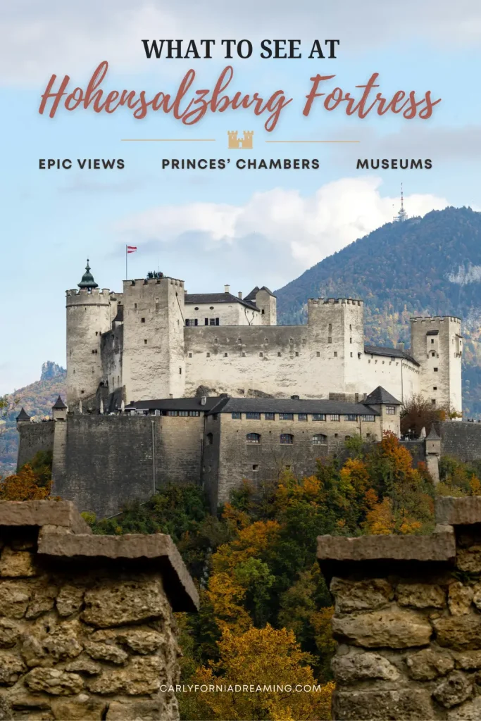 Pinterest pin showing Hohensalzburg Fortress in Salzburg, Austria, with autumn foliage and mountains in the background. Text reads “What to See at Hohensalzburg Fortress: Epic Views, Princes’ Chambers, Museums.”
